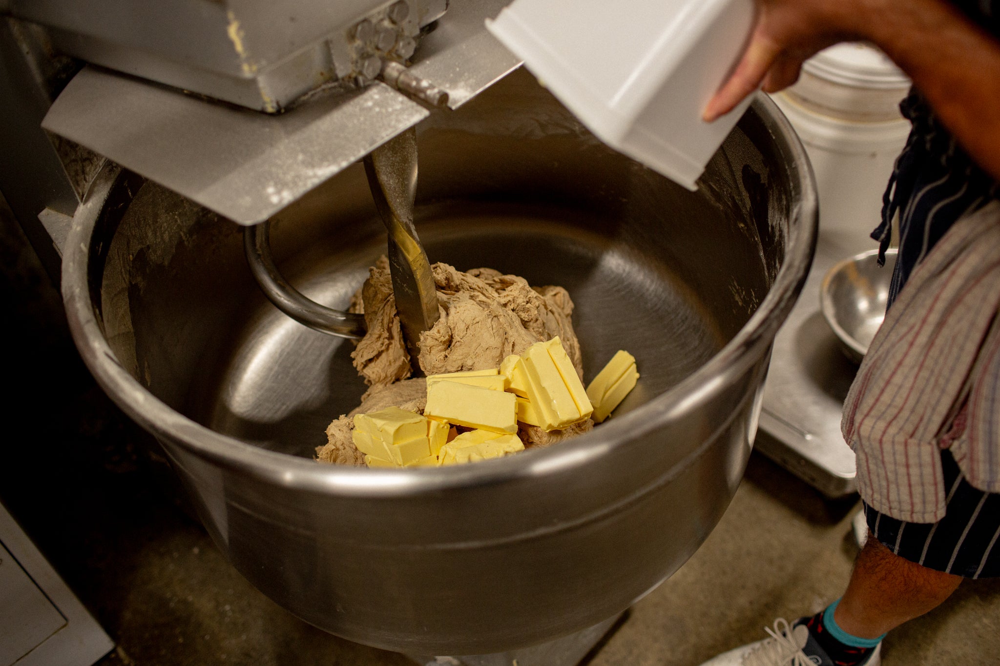 Volare Hot Cross Bun dough being mixed in a giant mixer