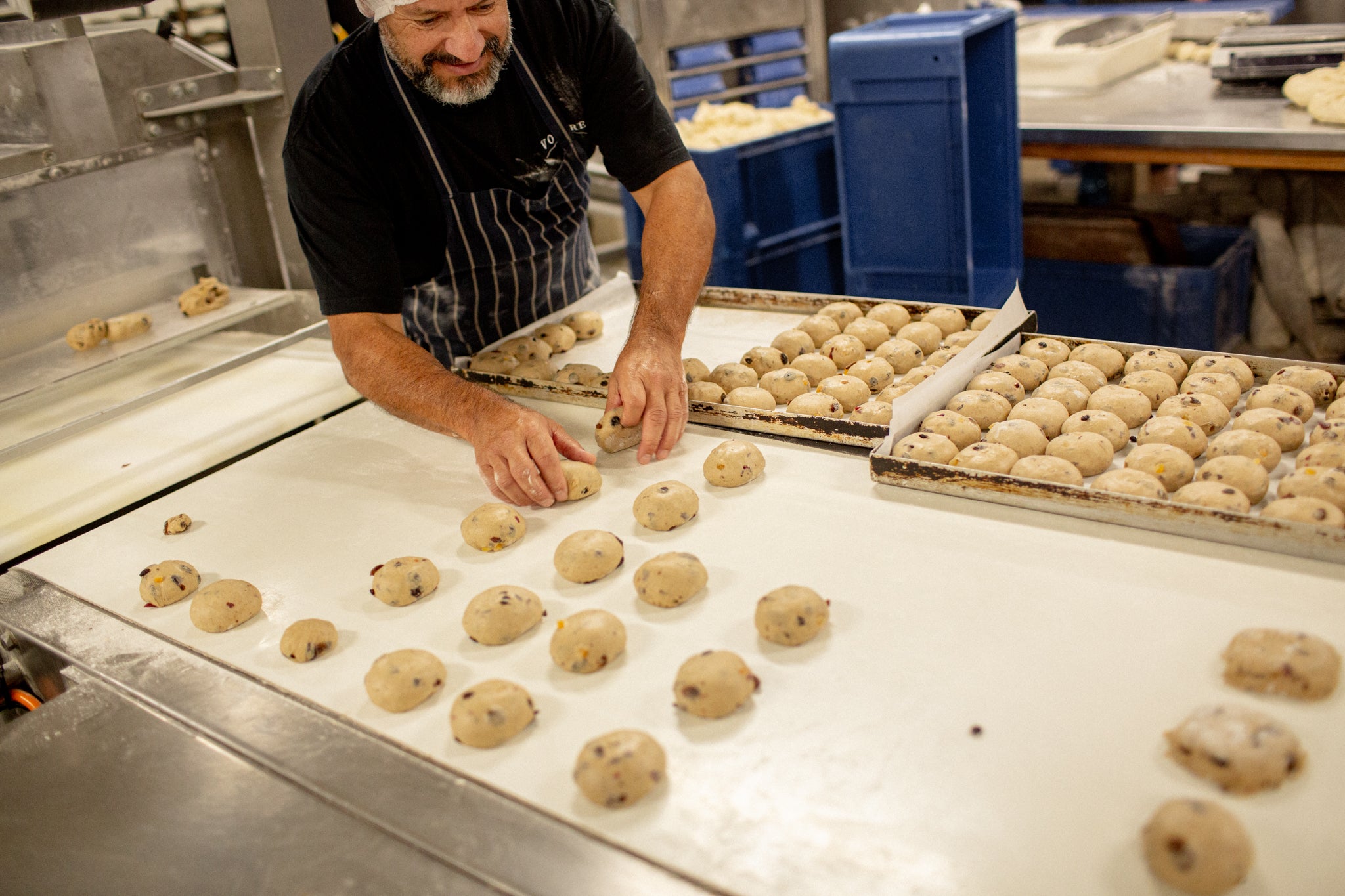 Dion rolling Hot Cross Bun dough