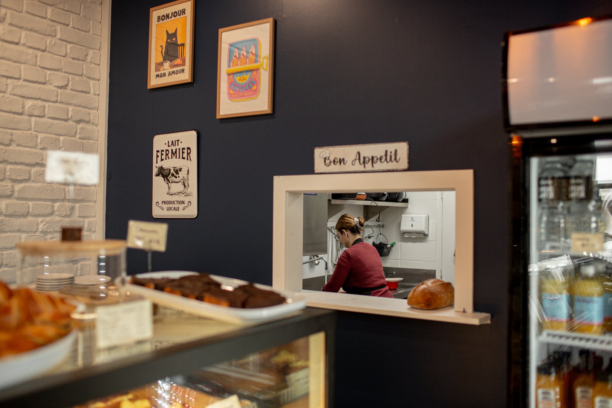 French Market owner, Marie, seen working through the pass