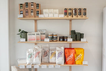 Merchandise shelves at Volare Bread Main Bakery store.