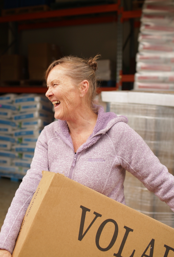 Photo of Gabbi collecting Volare food waste to deliver to those in need