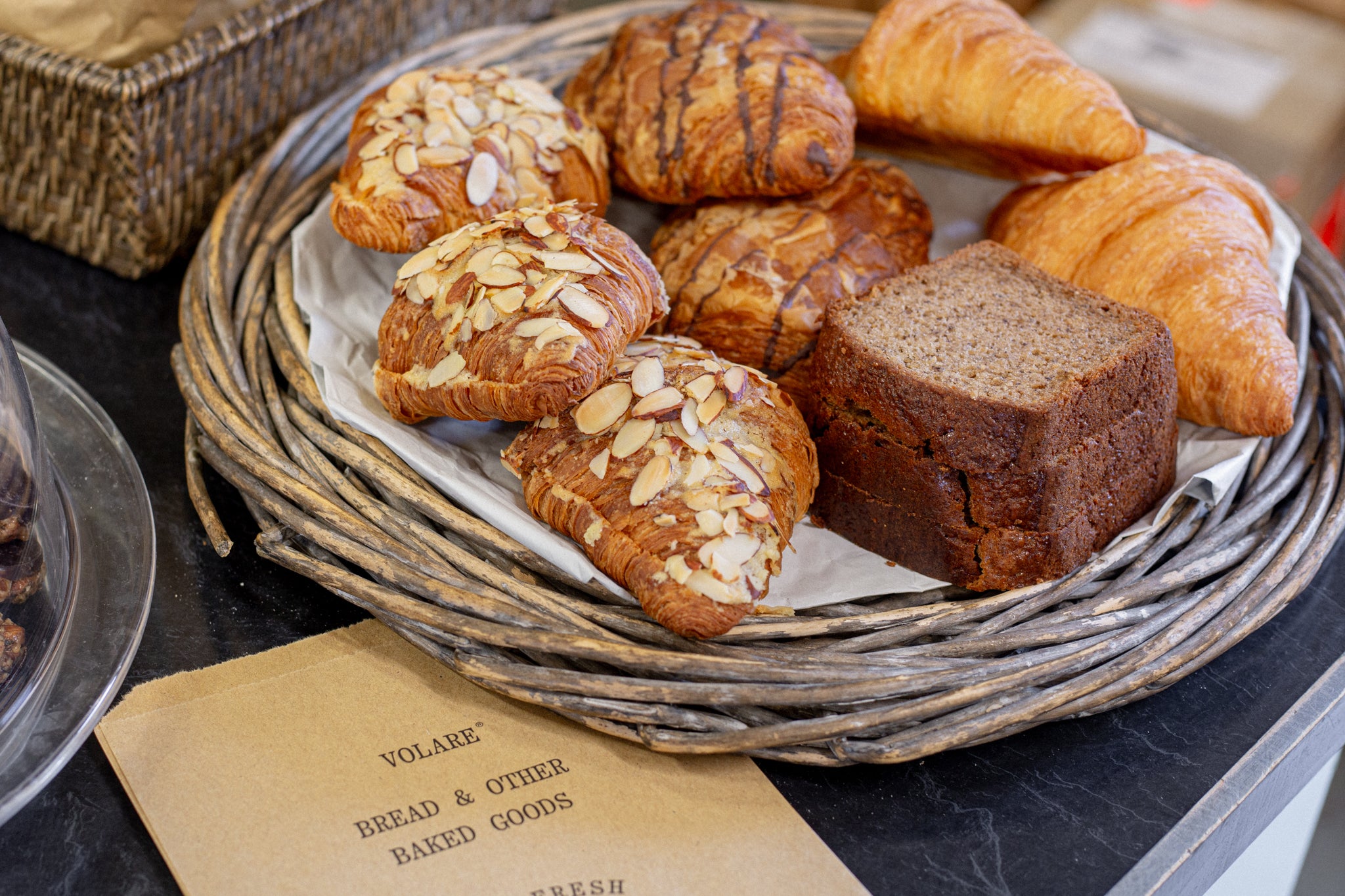 Volare Almond Croissants, Banana Bread, Pain au Chocolat on the counter at Herbal Dispensary