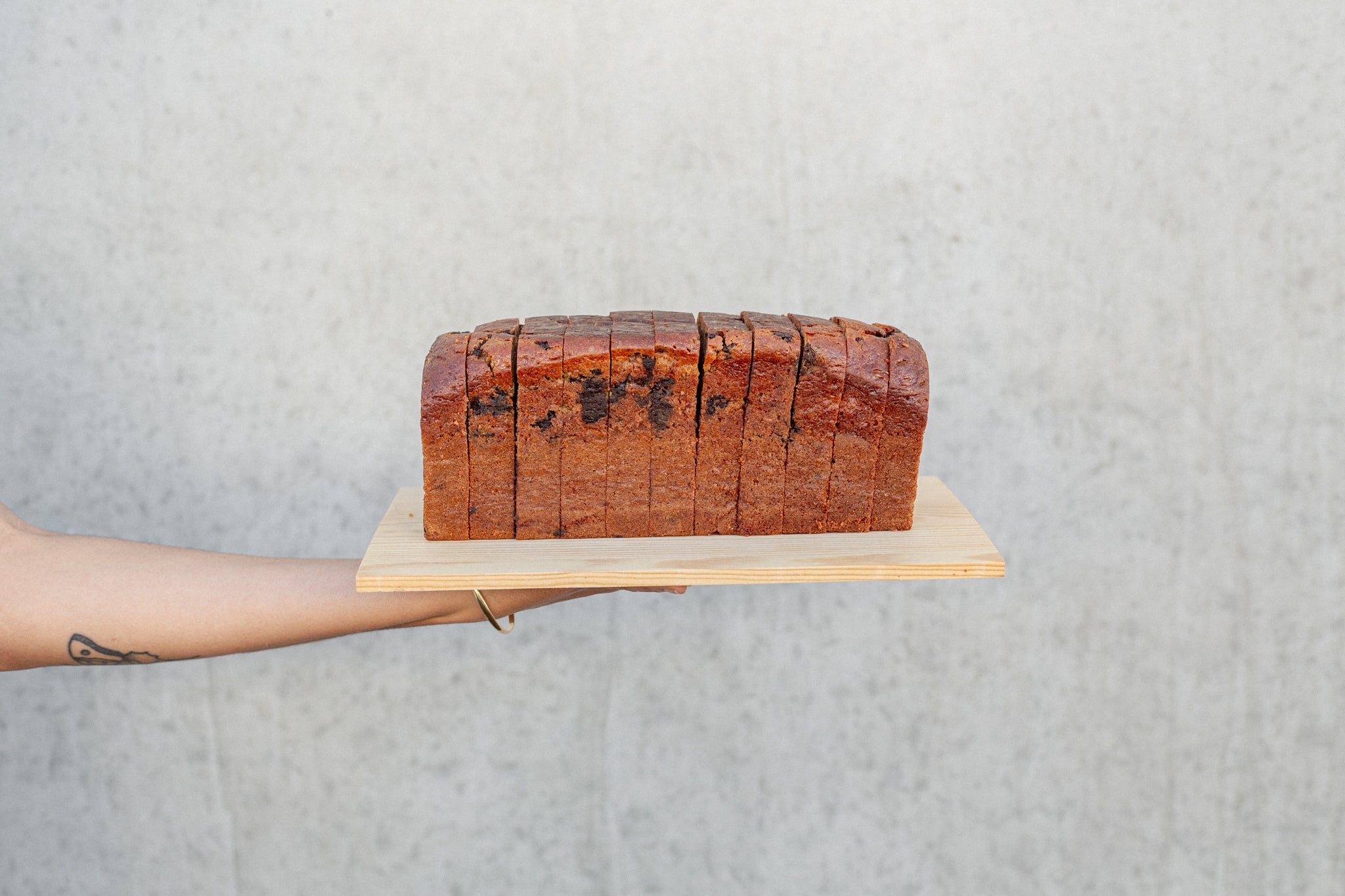 Loaf of Volare Chocolate Banana Bread on a chopping board