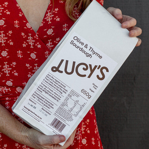 Person holding a package of Lucy