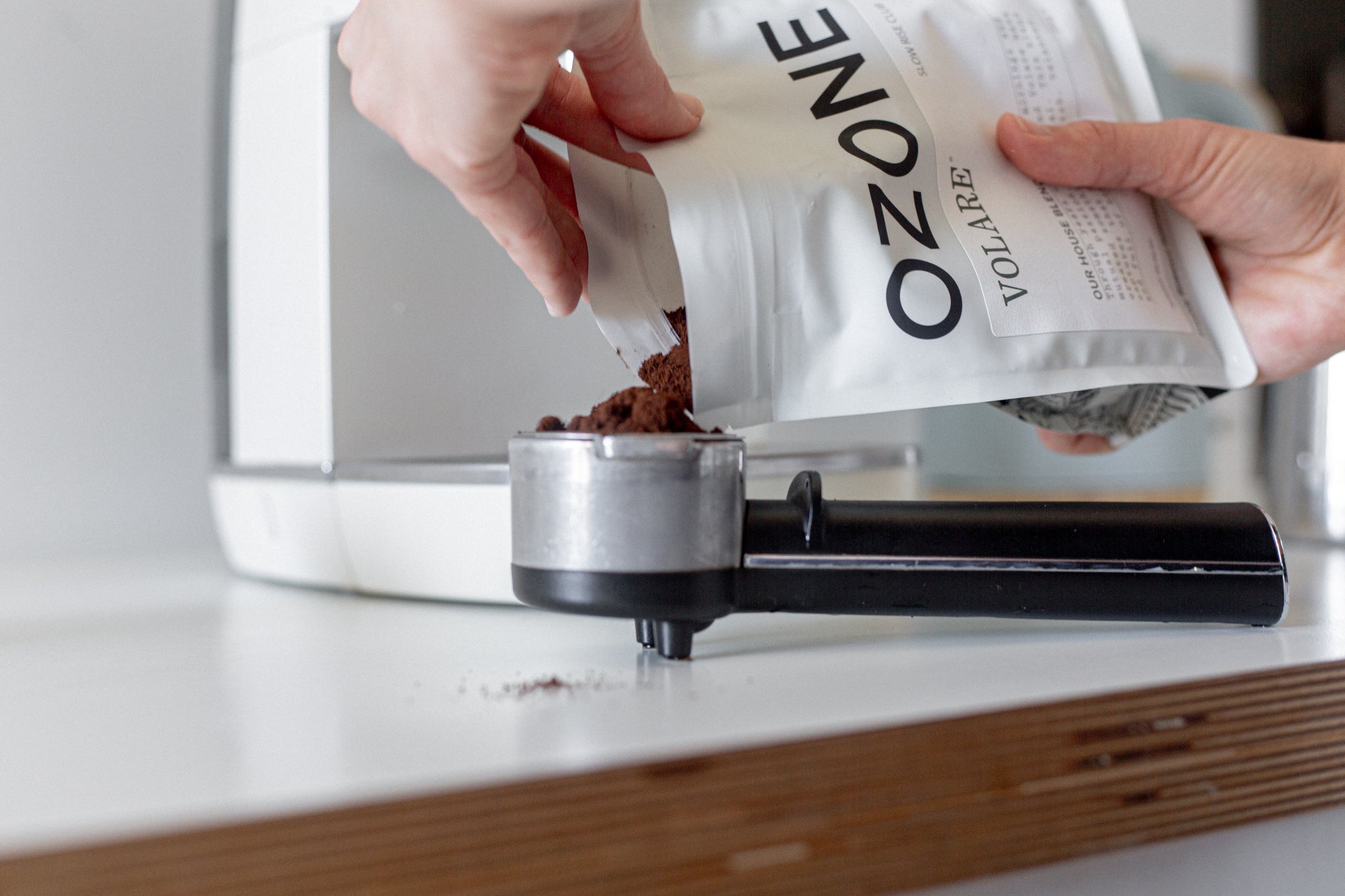 Close up of Ozone x Volare coffee being poured into a coffee maker