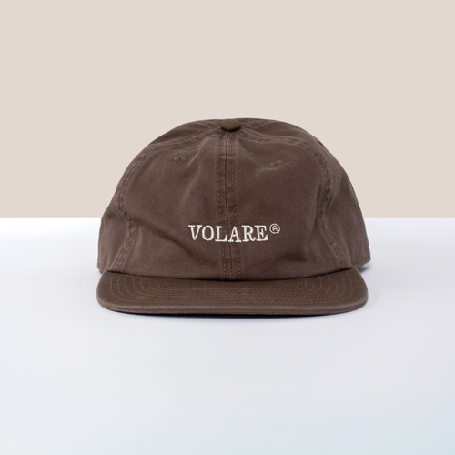 Front-on view of Volare brown cap