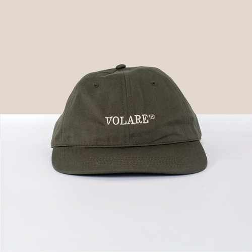 Front-on view of Volare green cap